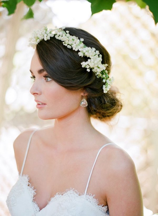 soft wedding updo with a floral crown