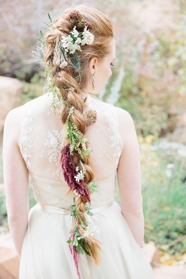 long boho braided wedding hairstyle with wildflowers