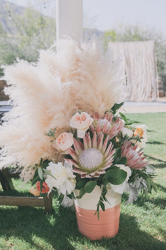 pink protea and pink garden roses wedding decor