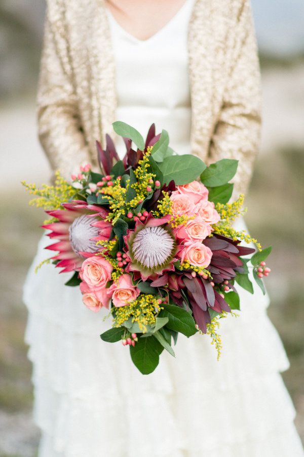 protea and roses wedding bouquet