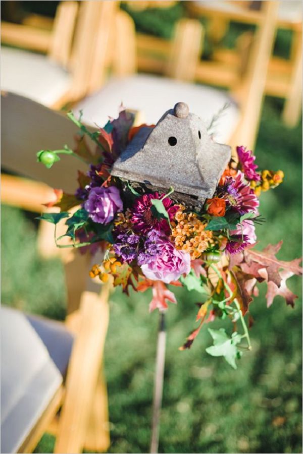 purple and orange floral aisle decor