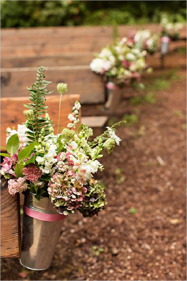 rustic outdoor wedding ceremony aisle decor