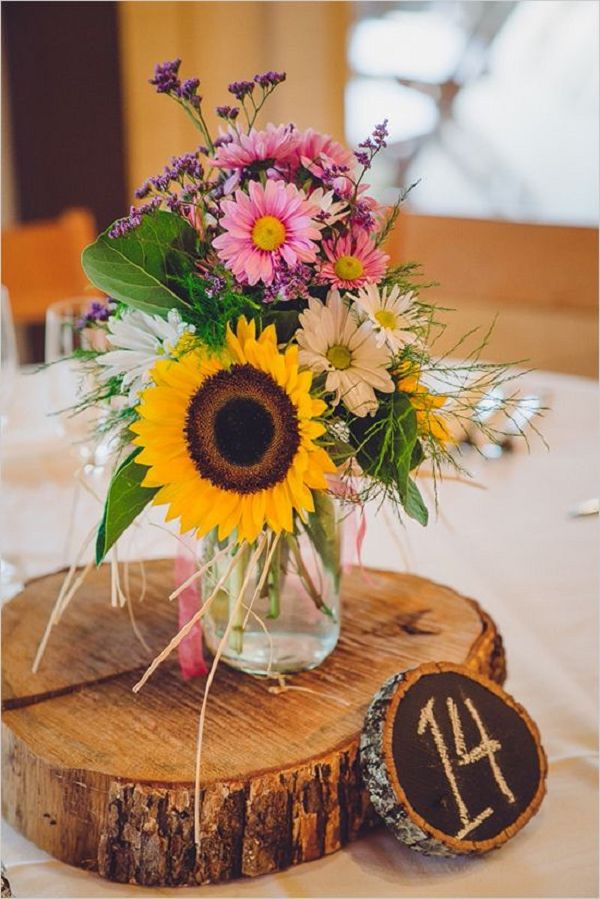 rustic sunflowers and wood wedding centerpiece