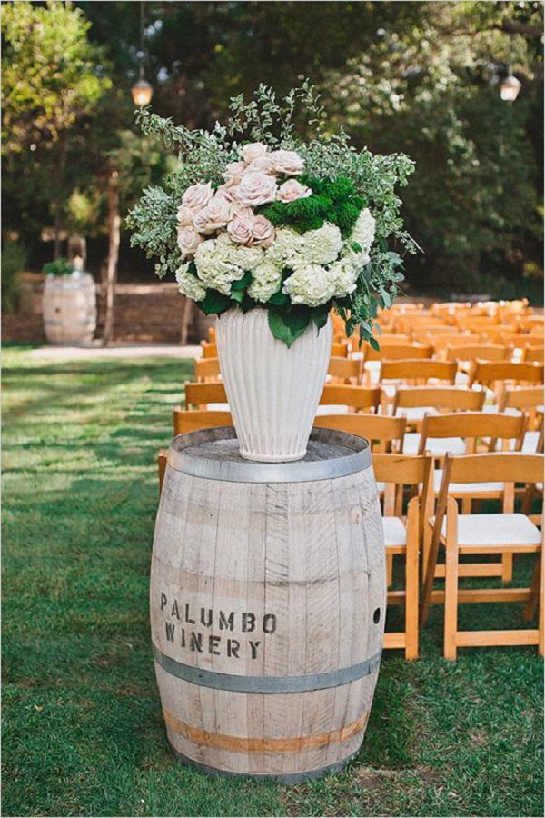 rustic wine barrel flower arrangement
