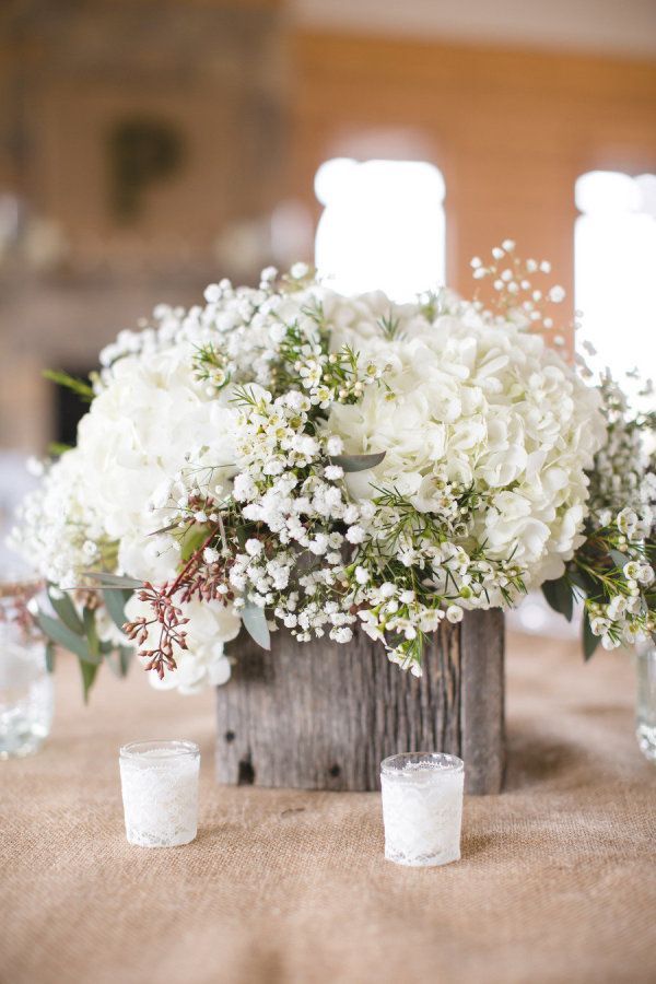 rustic wooden all white flowers wedding centerpiece