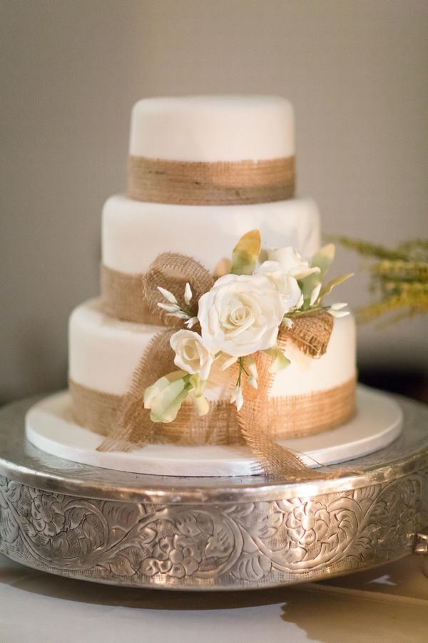 Rustic wedding cake with burlap trim