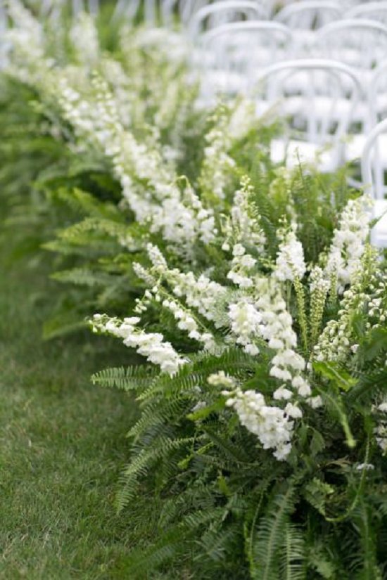 green fern wedding ceremony flowers