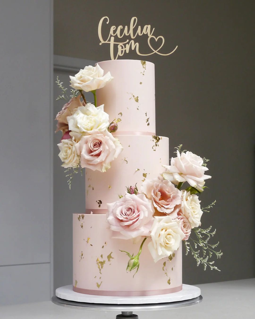 romantic 3 tier pink wedding cake with roses via alcakemy