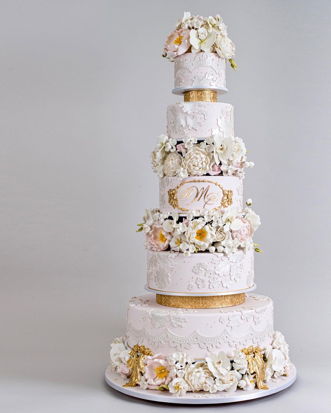romantic large 5 tier vintage lace wedding cake with gold via rbicakes