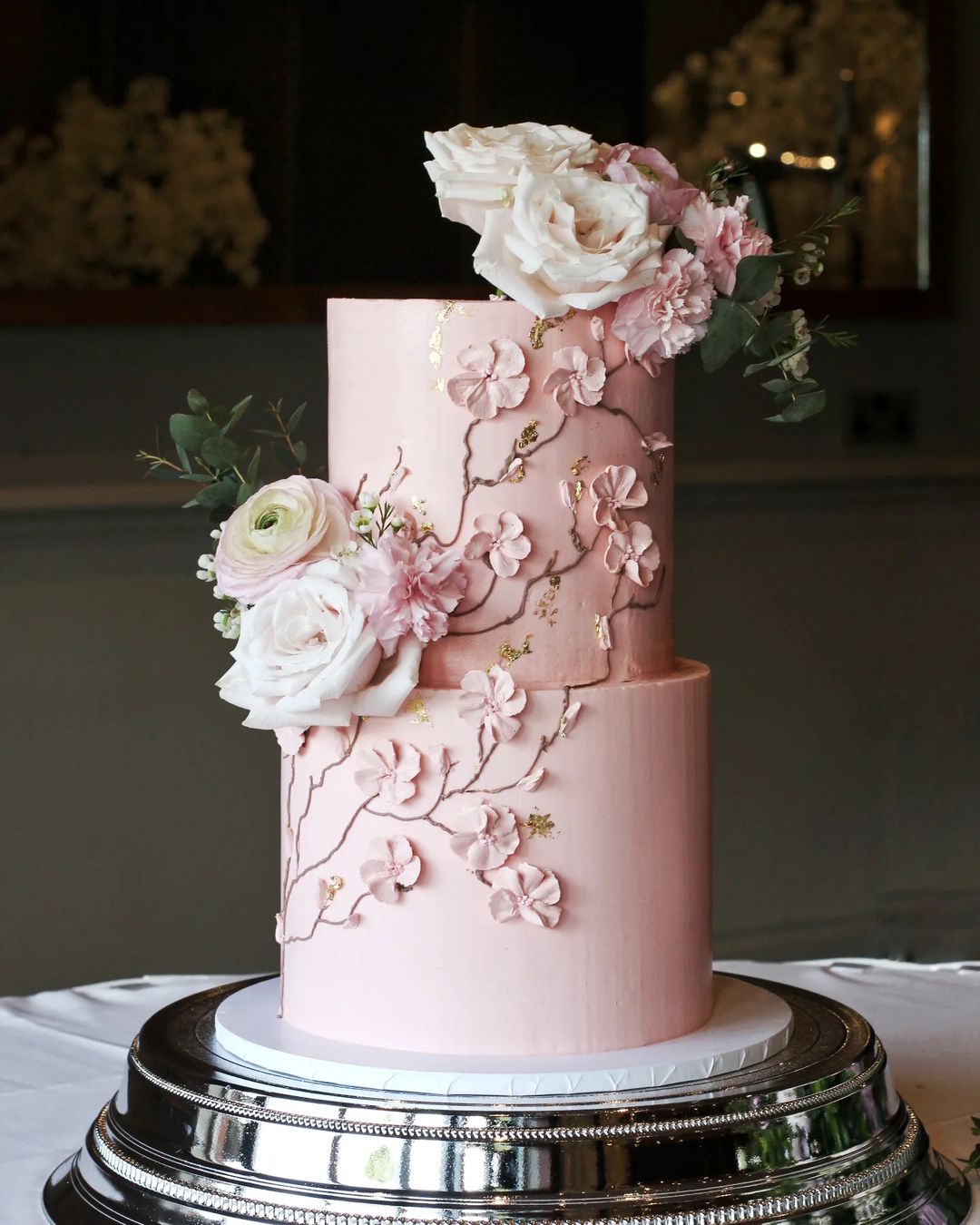 romantic two tier pink wedding cake with flowers via natalie_cakestudio