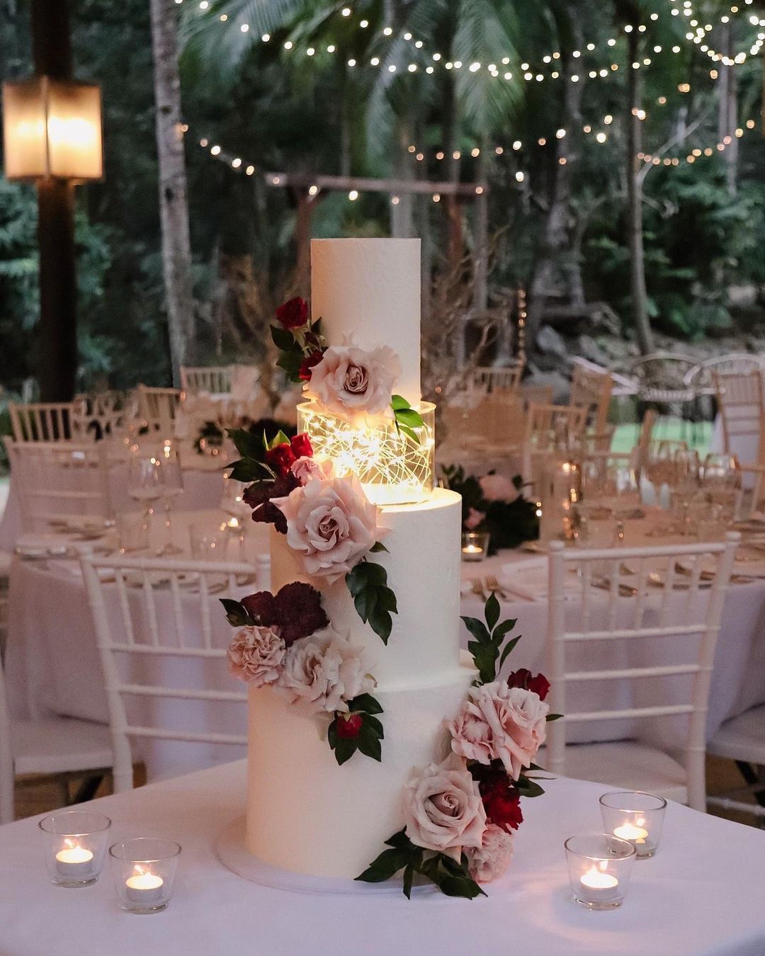 romantic wedding cake with floating lighting via milkandhoney.cakecreative