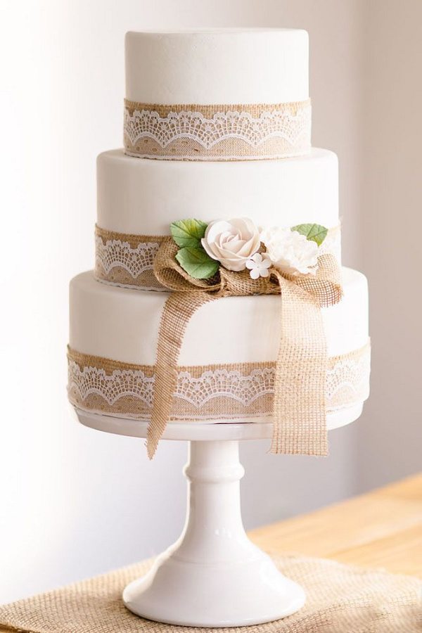 rustic white wedding cake with burlap lace details