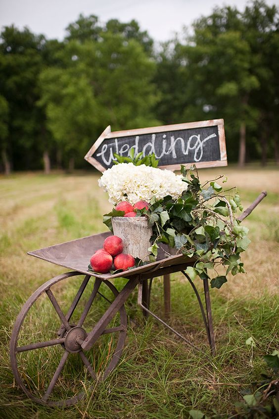 Antique wheelbarrow wedding sign for outdoor wedding