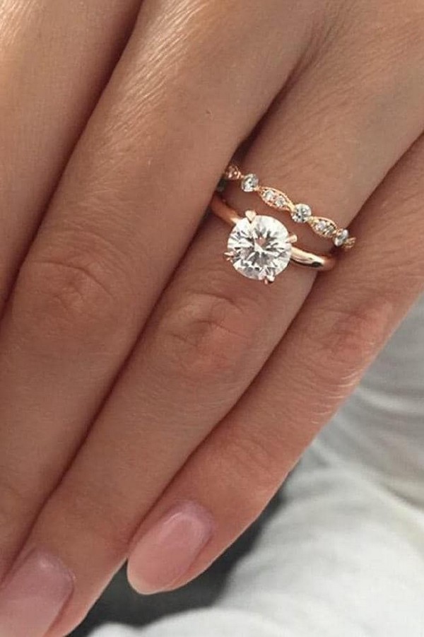 Art deco engagement ring with rose gold band