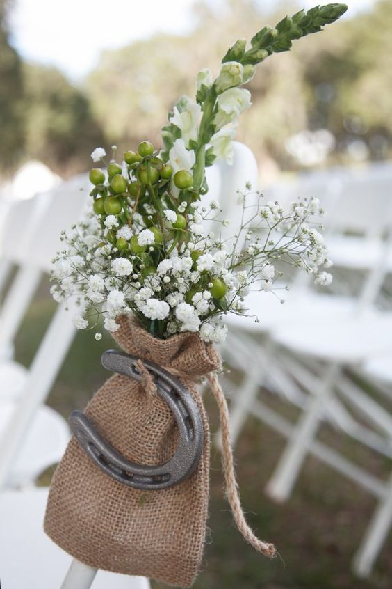 farm wedding with burlap baby's breath and horseshoe ideas