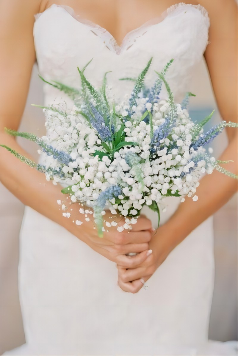 light blue and white babys breath wedding bouquet