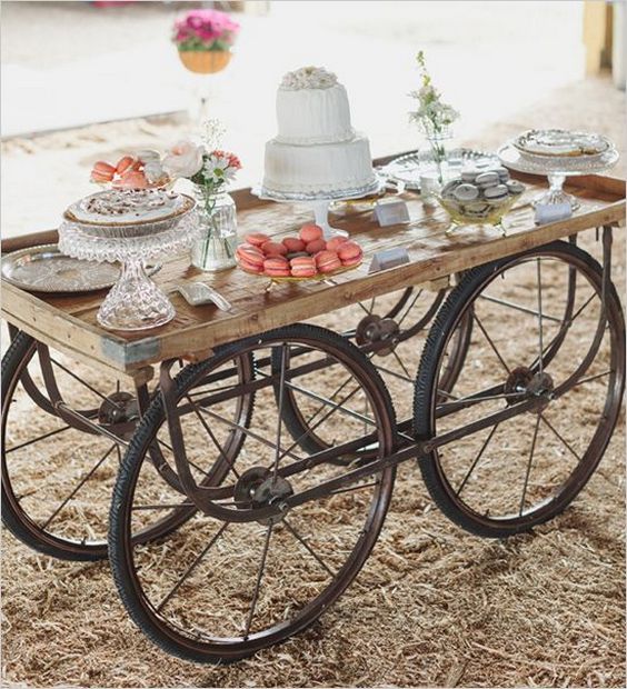 old farm equipment used as cake table
