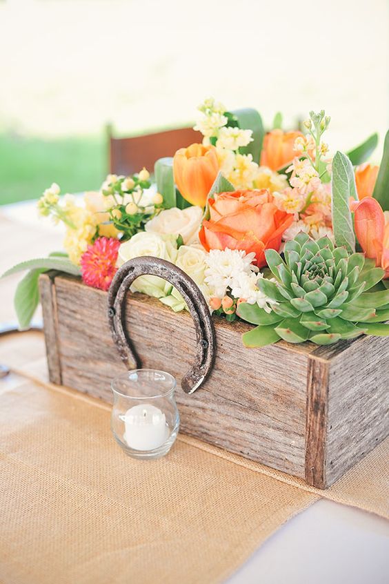 rustic succulent wooden box and horseshoe wedding centerpiece