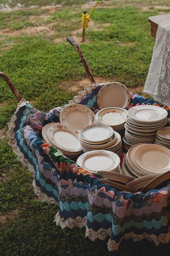 wheelbarrow quilt and mixed china for a buffet