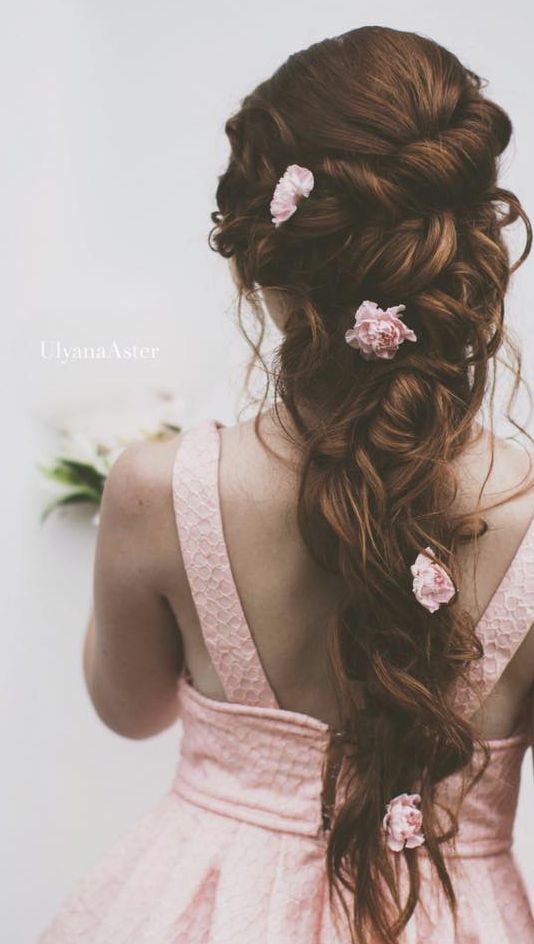 Ulyana Aster long wedding hairstyle with flowers