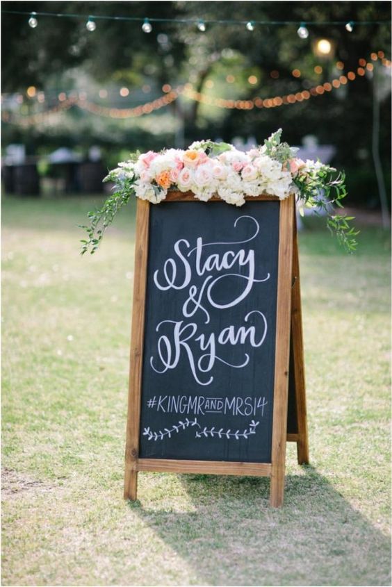 backyard chalkboard wedding sign