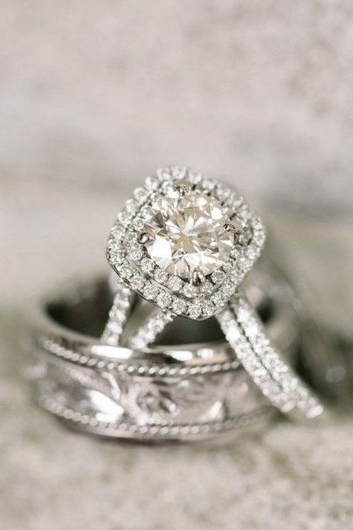 Double halo split shank round-cut diamond engagement ring