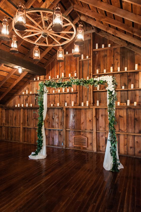 Eucalyptus Garland Wedding Arch and wagon wheel wedding chandelier
