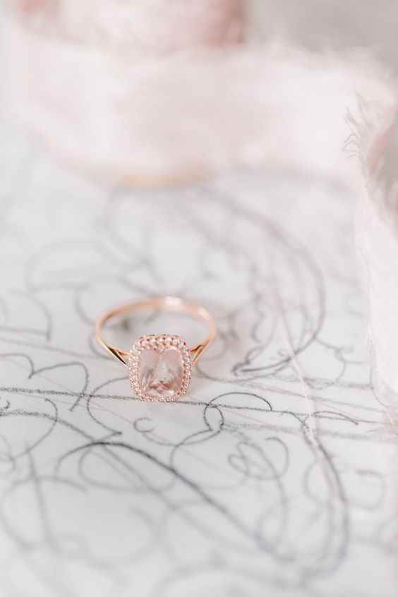 Peach sapphire + rose gold engagement ring