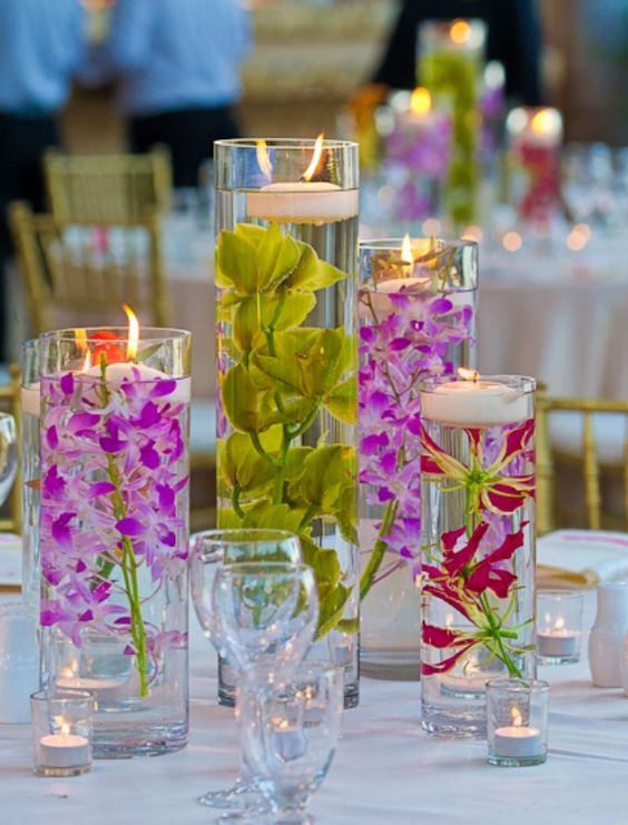 submerged flowers with floating candles