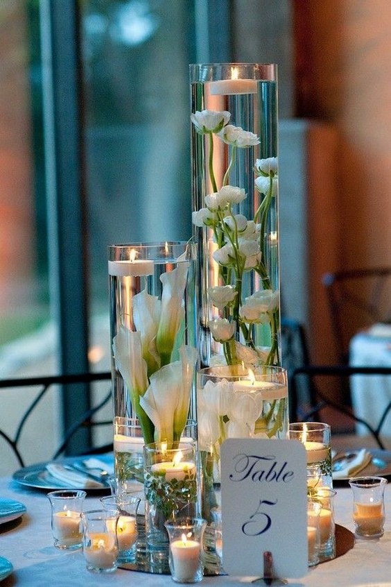 white candles wedding centerpiece