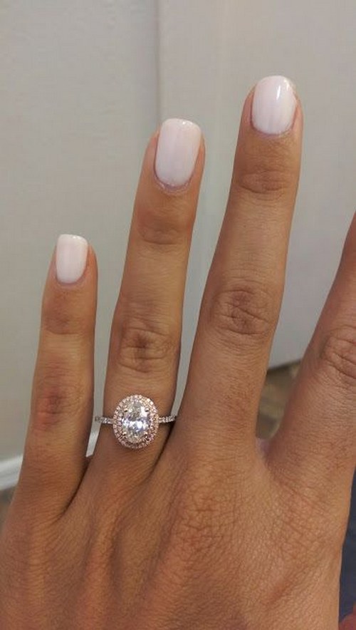 white gold band, rose gold setting, oval stone, double halo