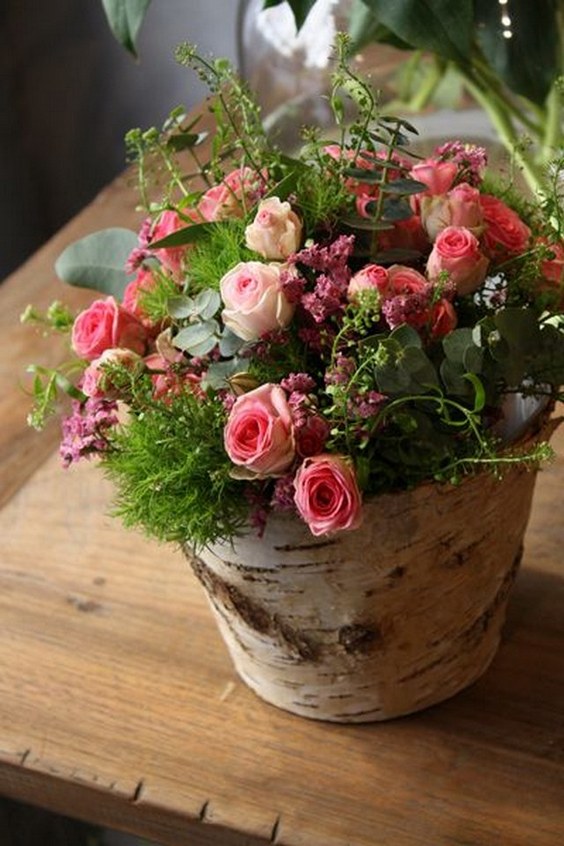 Birch Aspen bark containers with a sweet pink spray rose with trick dianthis arrangement