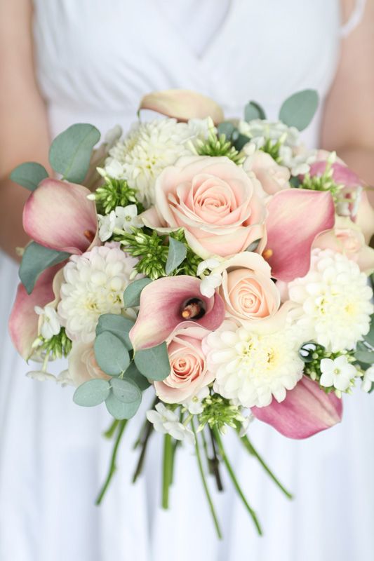 Dahlia, sweet avalanche roses, phlox, calla lilies and eucalyptus wedding bouquet