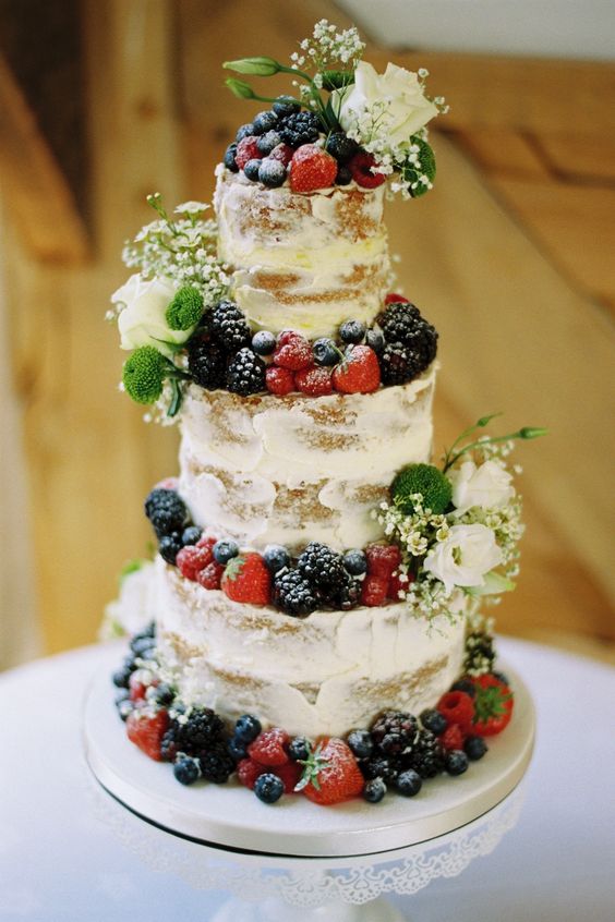 Delicious fruit and flower naked cake