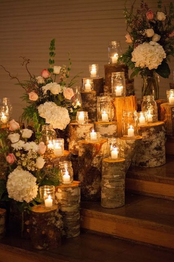 Tree stump and candle wedding ceremony decor