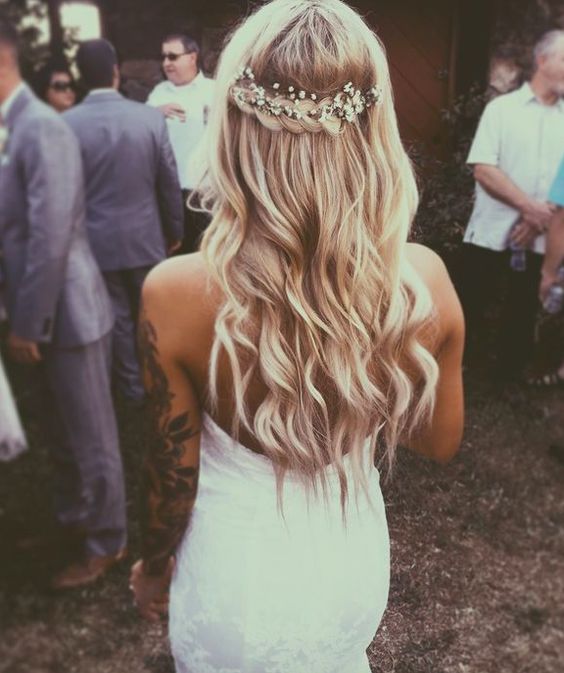 back braid crown wedding hairstyle with baby’s breath
