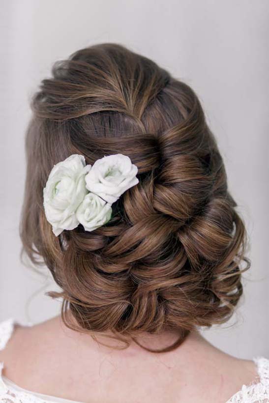 curly wedding hairstyle updo via olga larionova