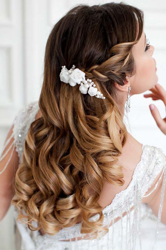long wavy wedding hairstyle for long hair via aleksandra prudnikov