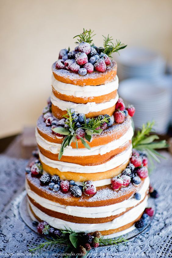 naked wedding cake with berries