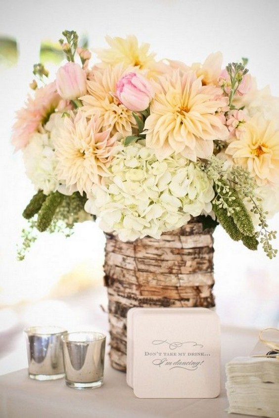rustic wedding flowers on bark container