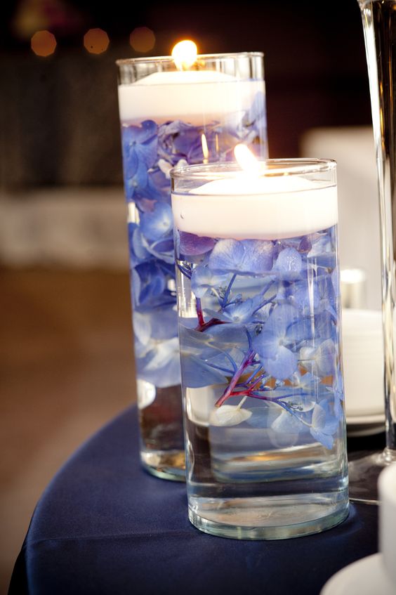submerged blue hydrangea candles floating wedding centerpiece