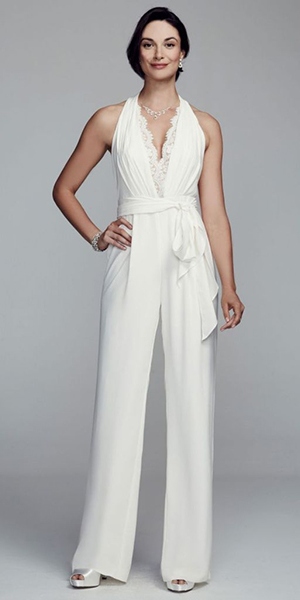 Halter crepe wedding jumpsuit by DB Studio featuring a lace trim deep v-neckline with lace back