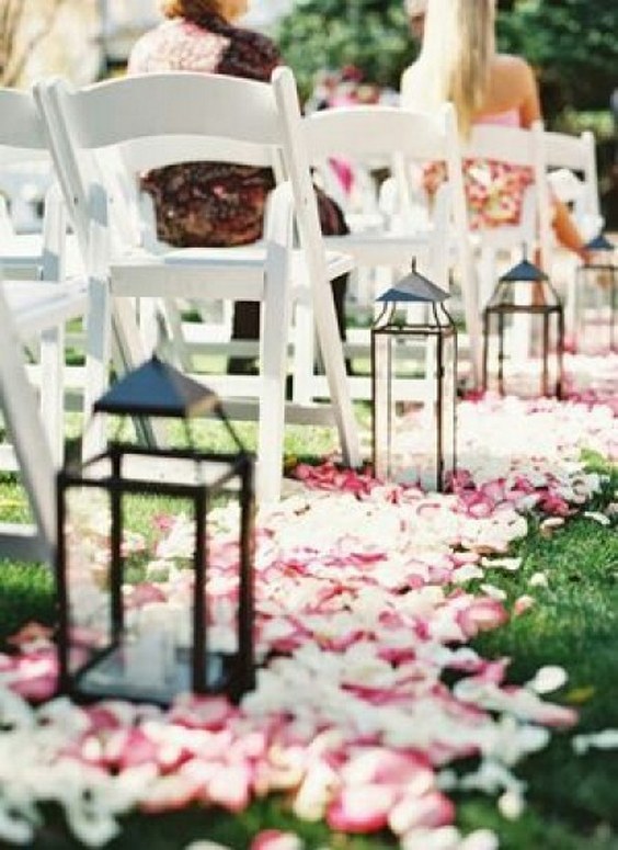 Rent lanterns for the aisle of an outdoor wedding ceremony