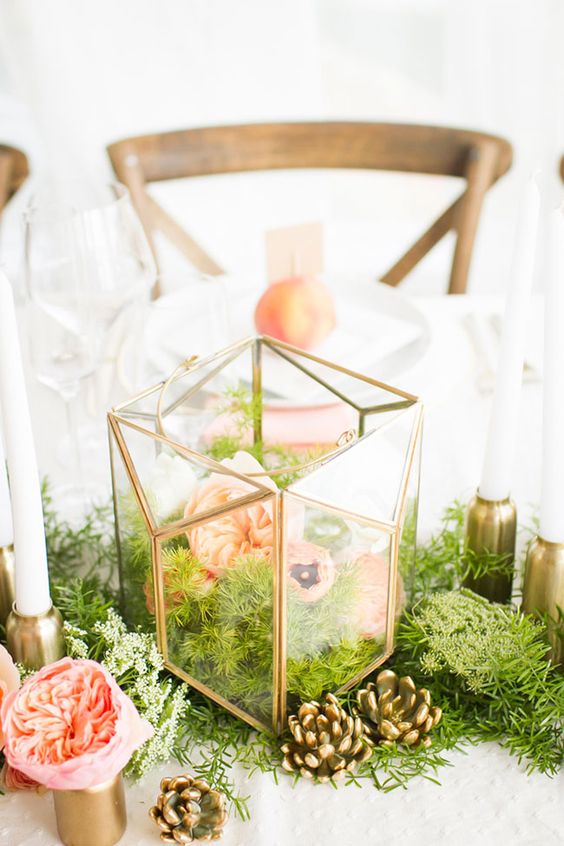 Rustic moss and flowers wedding centerpiece