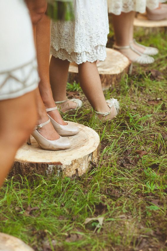 have bridesmaids stand on wood slices so their heels don't sink! photo by Kelly Maughan Photography