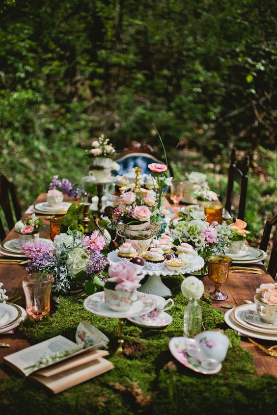 Whimsical Alice In Wonderland Moss Wedding Centerpiece