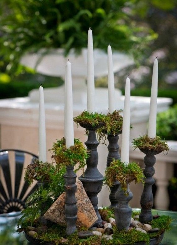 moss and candles wedding centerpiece