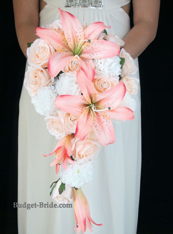 30 Stunning Cascading Wedding Bouquets 11 Cascading Coral and Peach Wedding Bouquet with white carnations, peach roses and accented with beautiful Coral Lillies