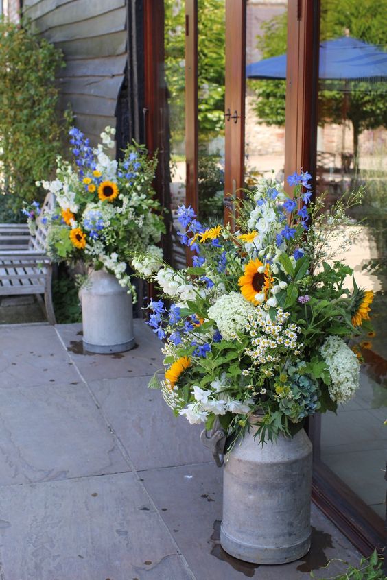 Milk churns outside the Ceremony