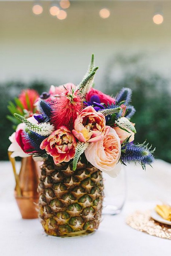 Pineapple vase of flowers